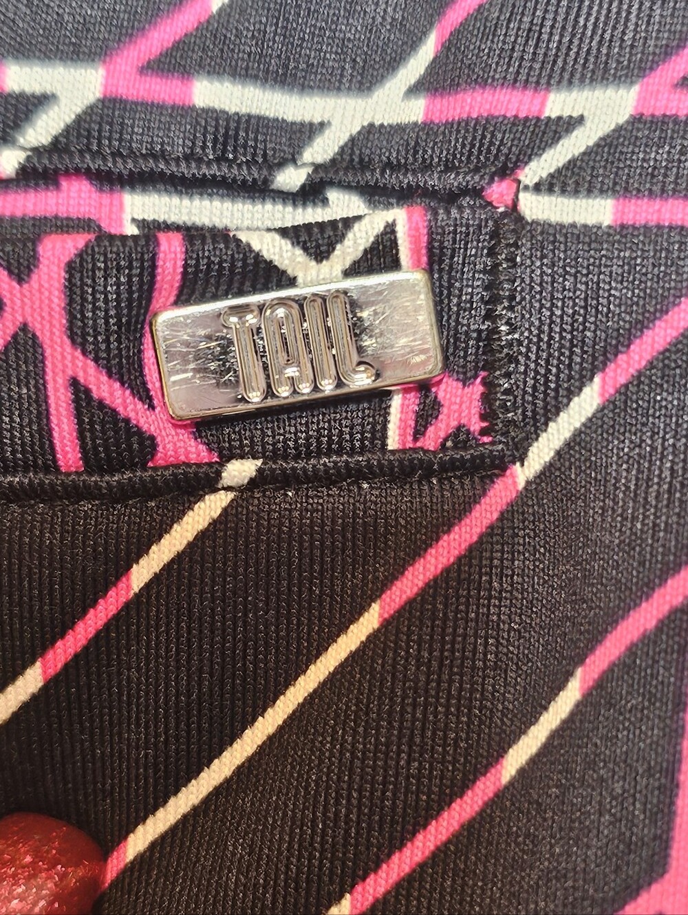 Tail Graphic Print Black and Pink Flounce Golf Skort - Picture 5 of 15